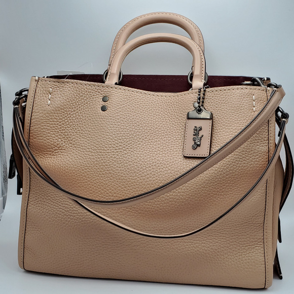 coach rogue nude pink